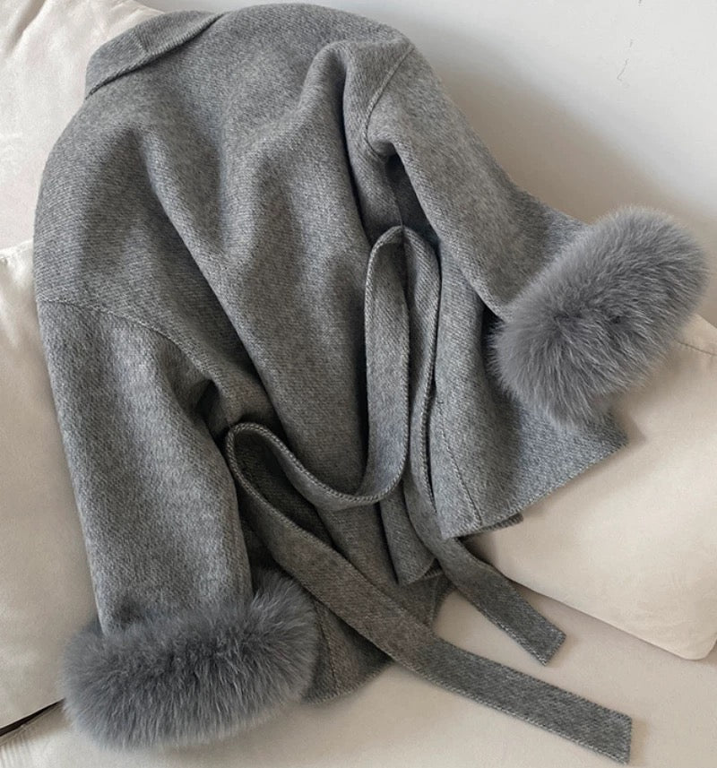Veste avec manches en fourrure