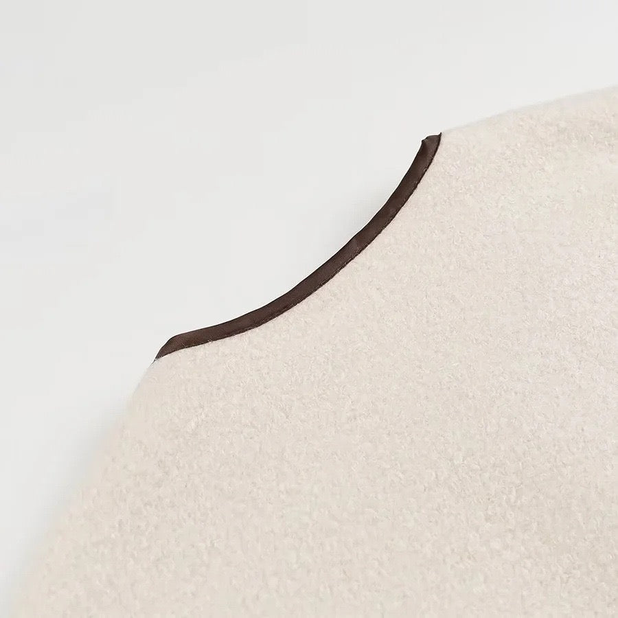 Veste en laine beige avec nœud