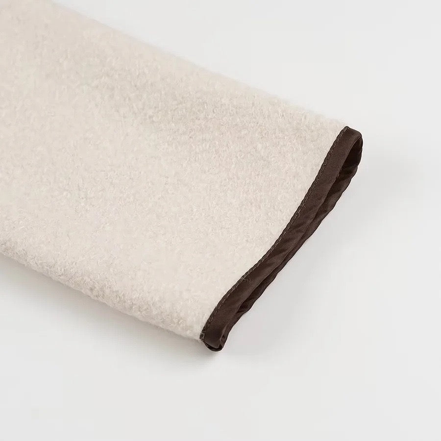 Veste en laine beige avec nœud