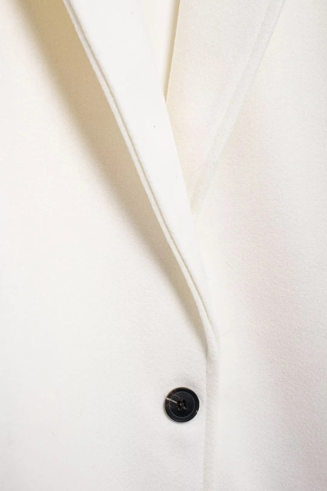 Manteau en laine crème