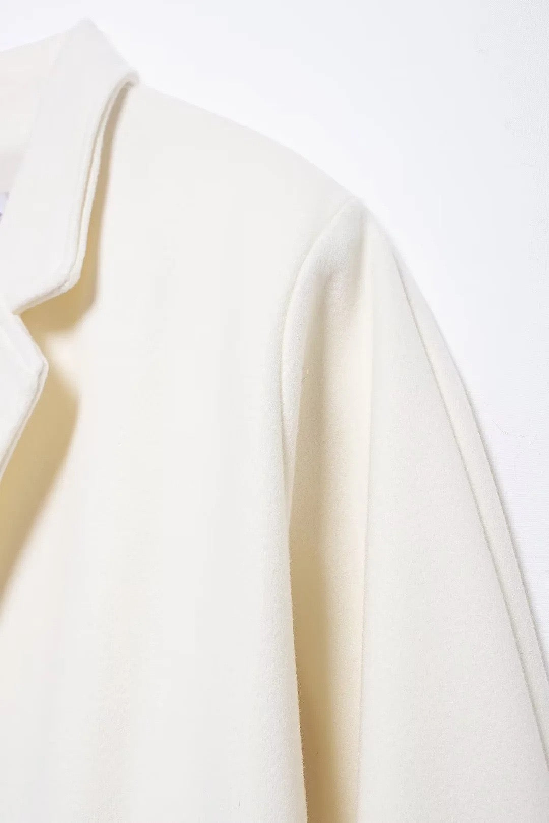 Manteau en laine crème