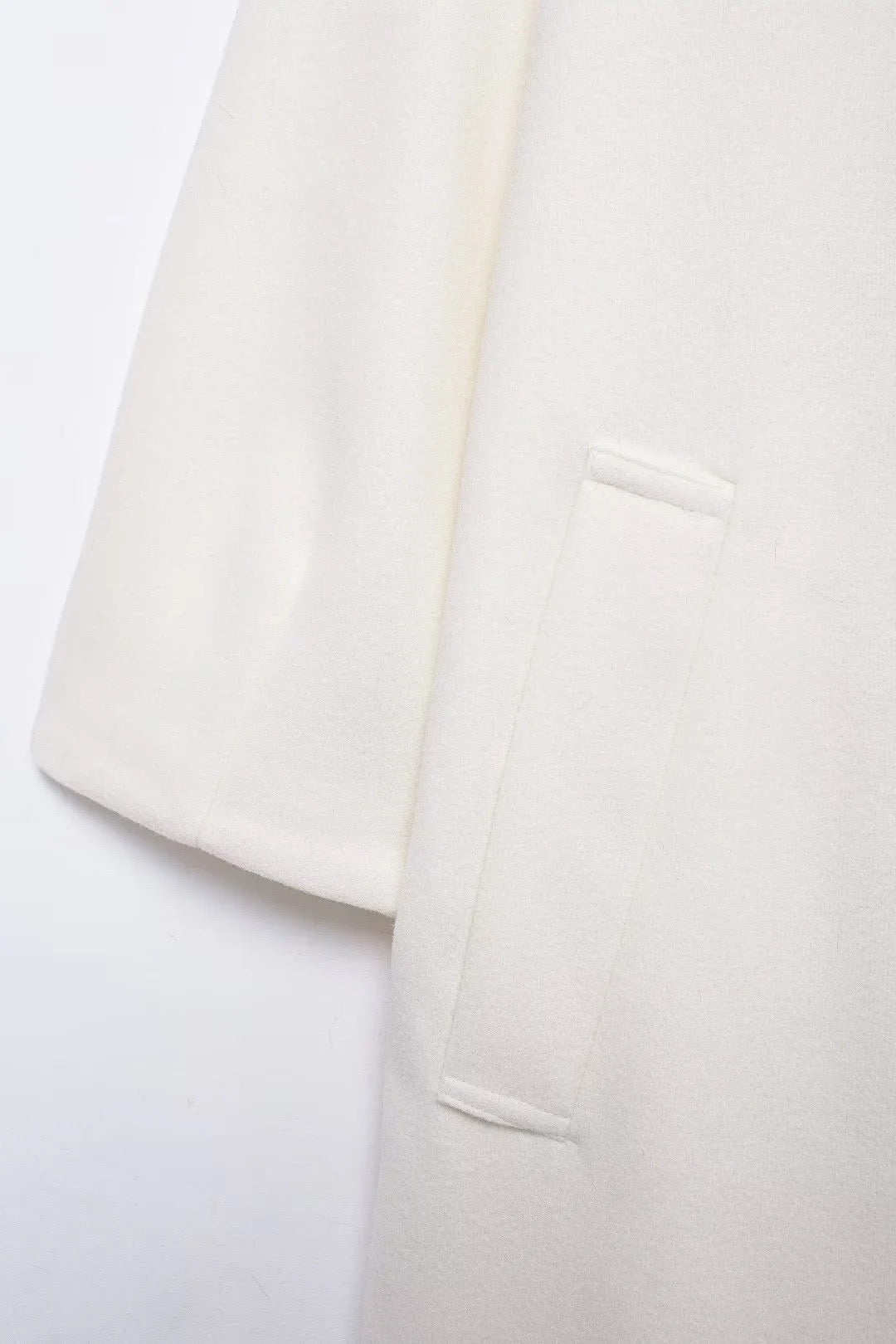 Manteau en laine crème