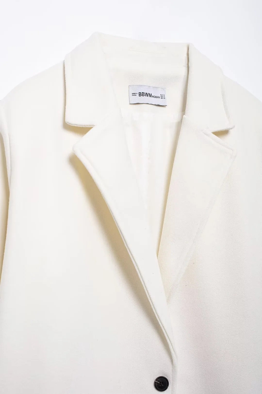 Manteau en laine crème