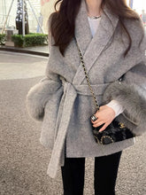 Veste avec manches en fourrure