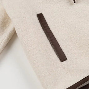 Veste en laine beige avec nœud