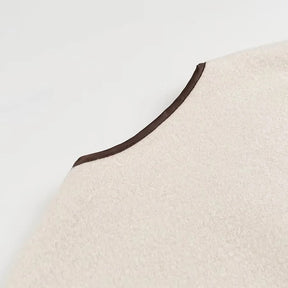 Veste en laine beige avec nœud