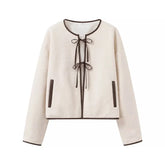 Veste en laine beige avec nœud