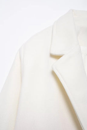 Manteau en laine crème