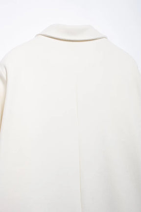 Manteau en laine crème
