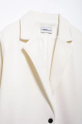 Manteau en laine crème
